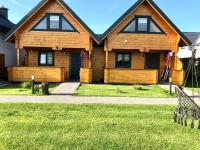 Vonkajšia záhrada v ubytovaní Delfinek - Domki Apartamenty