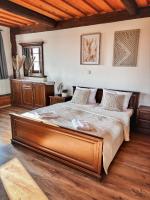 Postel nebo postele na pokoji v ubytování Wellness hotel & minipivovar Kněžínek