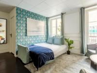 Posteľ alebo postele v izbe v ubytovaní Cozy Apartment - Champs Elysees - Grande Armee