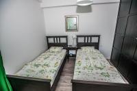 Posteľ alebo postele v izbe v ubytovaní Dadule Apartments