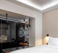 Postel nebo postele na pokoji v ubytování Amazon Hotel