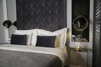 Łóżko lub łóżka w pokoju w obiekcie MINT Boutique Studio Apartments
