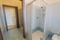 A bathroom at "Il Segreto" Vista Panoramica sulle Isole Eolie con Piscina, palestra e WiFi