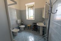 A bathroom at "Il Segreto" Vista Panoramica sulle Isole Eolie con Piscina, palestra e WiFi