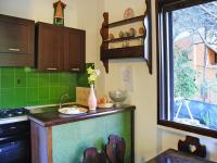 A kitchen or kitchenette at Holiday homes in Santa Margherita di Pula