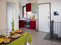 A kitchen or kitchenette at Holiday homes in Santa Margherita di Pula
