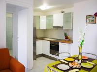 A kitchen or kitchenette at Holiday homes in Santa Margherita di Pula