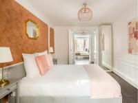 Posteľ alebo postele v izbe v ubytovaní Cozy Apartment - Louvre - ND des Victoires
