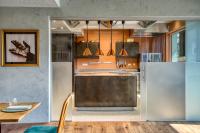 A kitchen or kitchenette at Boutiquehotel ZOMM in Seefeld