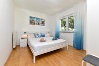 Posteľ alebo postele v izbe v ubytovaní Apartments Vlasta 1410