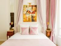 Łóżko lub łóżka w pokoju w obiekcie Merveil - Luxury Suite - Louvre - Marcel III