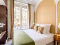 Łóżko lub łóżka w pokoju w obiekcie Merveil - Luxury Suite - Louvre - Marcel III