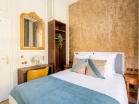 Łóżko lub łóżka w pokoju w obiekcie Merveil - Luxury Suite - Louvre - Marcel III