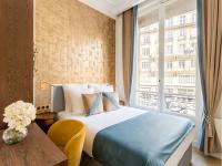 Łóżko lub łóżka w pokoju w obiekcie Merveil - Luxury Suite - Louvre - Marcel III