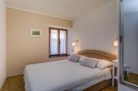 Postel nebo postele na pokoji v ubytování Beautiful Apartment Jelena 1
