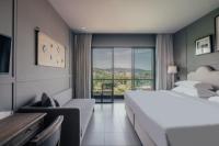 Sugar Marina Hotel -AVIATOR- Phuket Airportにあるベッド