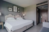 Sugar Marina Hotel -AVIATOR- Phuket Airportにあるベッド