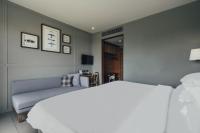 Sugar Marina Hotel -AVIATOR- Phuket Airportにあるベッド