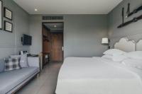 Sugar Marina Hotel -AVIATOR- Phuket Airportにあるベッド