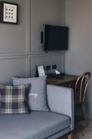 Sugar Marina Hotel -AVIATOR- Phuket Airportにあるテレビまたはエンターテインメントセンター