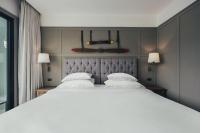 Sugar Marina Hotel -AVIATOR- Phuket Airportにあるベッド