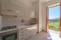 Kuchnia lub aneks kuchenny w obiekcie Appartamento Bellavista a Fetovaia - Goelba