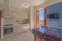 Kuchnia lub aneks kuchenny w obiekcie Appartamento Bellavista a Fetovaia - Goelba