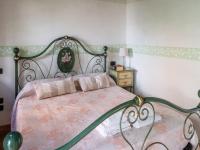 Posteľ alebo postele v izbe v ubytovaní Cozy Farmhouse in Citta' di Castello