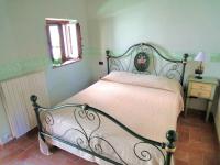 Posteľ alebo postele v izbe v ubytovaní Cozy Farmhouse in Citta' di Castello