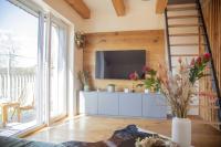 TV a/nebo společenská místnost v ubytování Nora Apartments