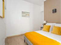 Posteľ alebo postele v izbe v ubytovaní Cozy Apartment - Champs Elysees - Wagram