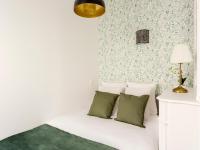 Posteľ alebo postele v izbe v ubytovaní Cozy Apartment - Champs Elysees - Wagram