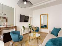 Televízia a/alebo spoločenská miestnosť v ubytovaní Cozy Apartment - Champs Elysees - Wagram