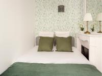 Posteľ alebo postele v izbe v ubytovaní Cozy Apartment - Champs Elysees - Wagram