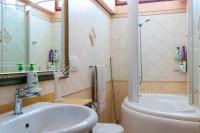 A bathroom at Casa Graziella the top holiday home