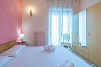A bed or beds in a room at Casa Graziella the top holiday home