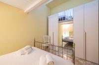 A bed or beds in a room at Casa Graziella the top holiday home