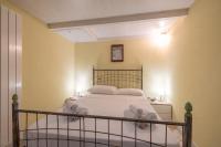 A bed or beds in a room at Casa Graziella the top holiday home