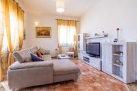 A television and/or entertainment centre at Casa Graziella the top holiday home