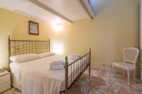 A bed or beds in a room at Casa Graziella the top holiday home