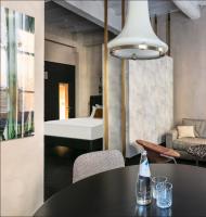 A bed or beds in a room at Numa Florence Palazzo Moro