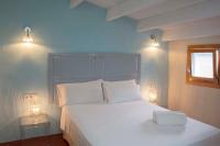 Postel nebo postele na pokoji v ubytování Boutique Hotel RifugioAzul