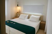 Posteľ alebo postele v izbe v ubytovaní Aristotelia Gi Ikies - Olympiada Poolside Retreats