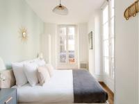 Posteľ alebo postele v izbe v ubytovaní Cozy Apartment - Opera - Caumartin I