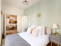 Posteľ alebo postele v izbe v ubytovaní Cozy Apartment - Opera - Caumartin I