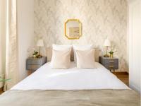 Posteľ alebo postele v izbe v ubytovaní Cozy Apartment - Opera - Caumartin I