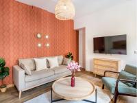 Televízia a/alebo spoločenská miestnosť v ubytovaní Cozy Apartment - Opera - Caumartin I