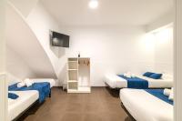 Posteľ alebo postele v izbe v ubytovaní Laramond Barcelona Rooms