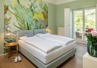 Postel nebo postele na pokoji v ubytování Seehotel Hubertushof