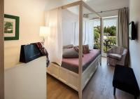 Postel nebo postele na pokoji v ubytování Seehotel Hubertushof